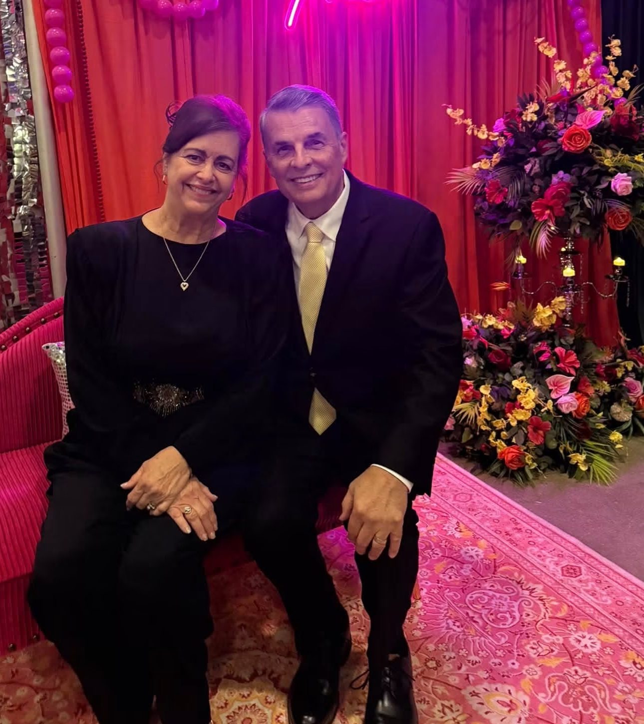Debbie and her husband, dressed up at a New Braunfels community event