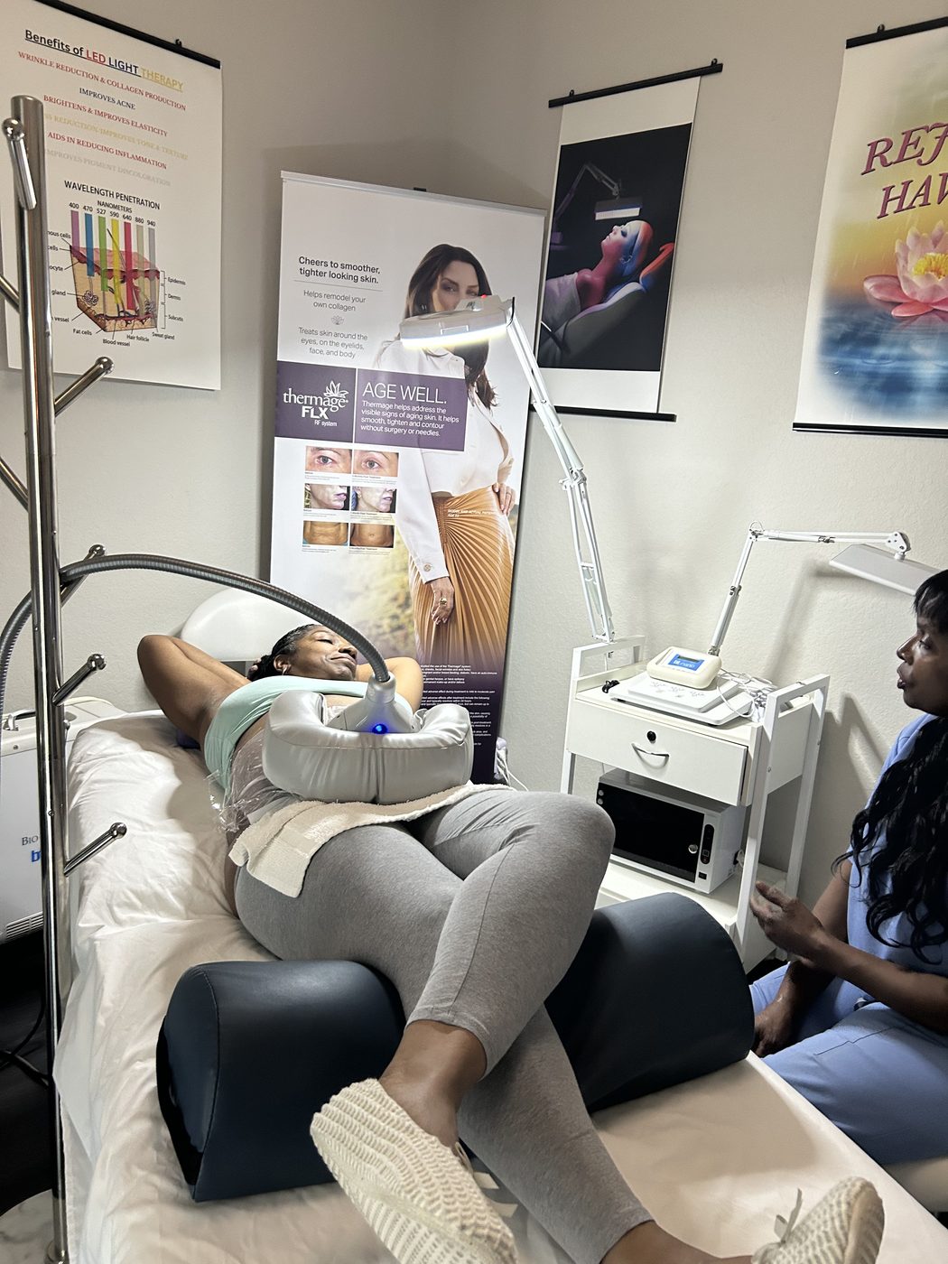 A guest settled in during her CoolSculpting session in the studio