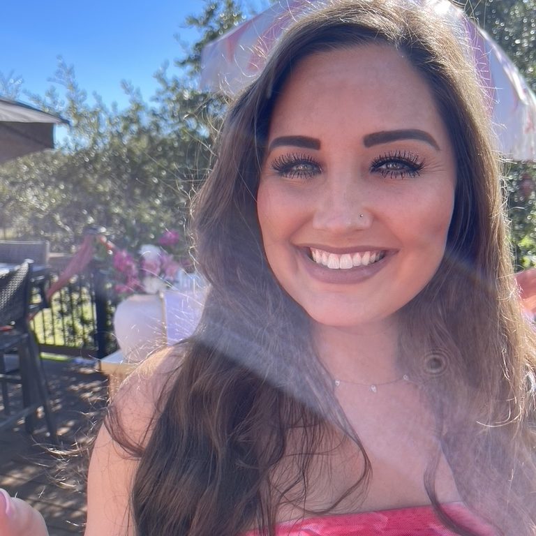 A Rejuva Haven guest smiling in the Texas sun